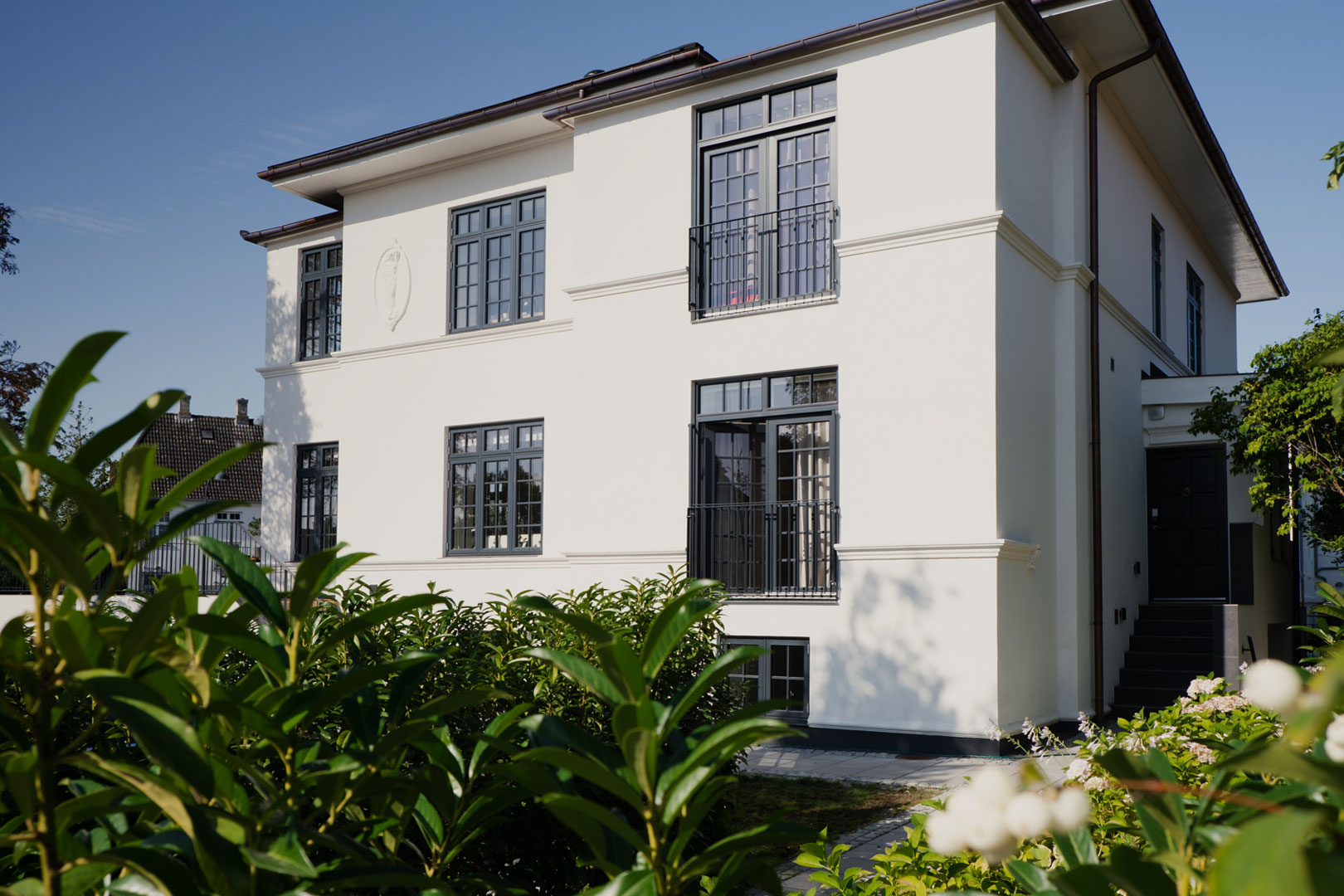 Beautiful Danish home exterior showcasing premium windows and doors